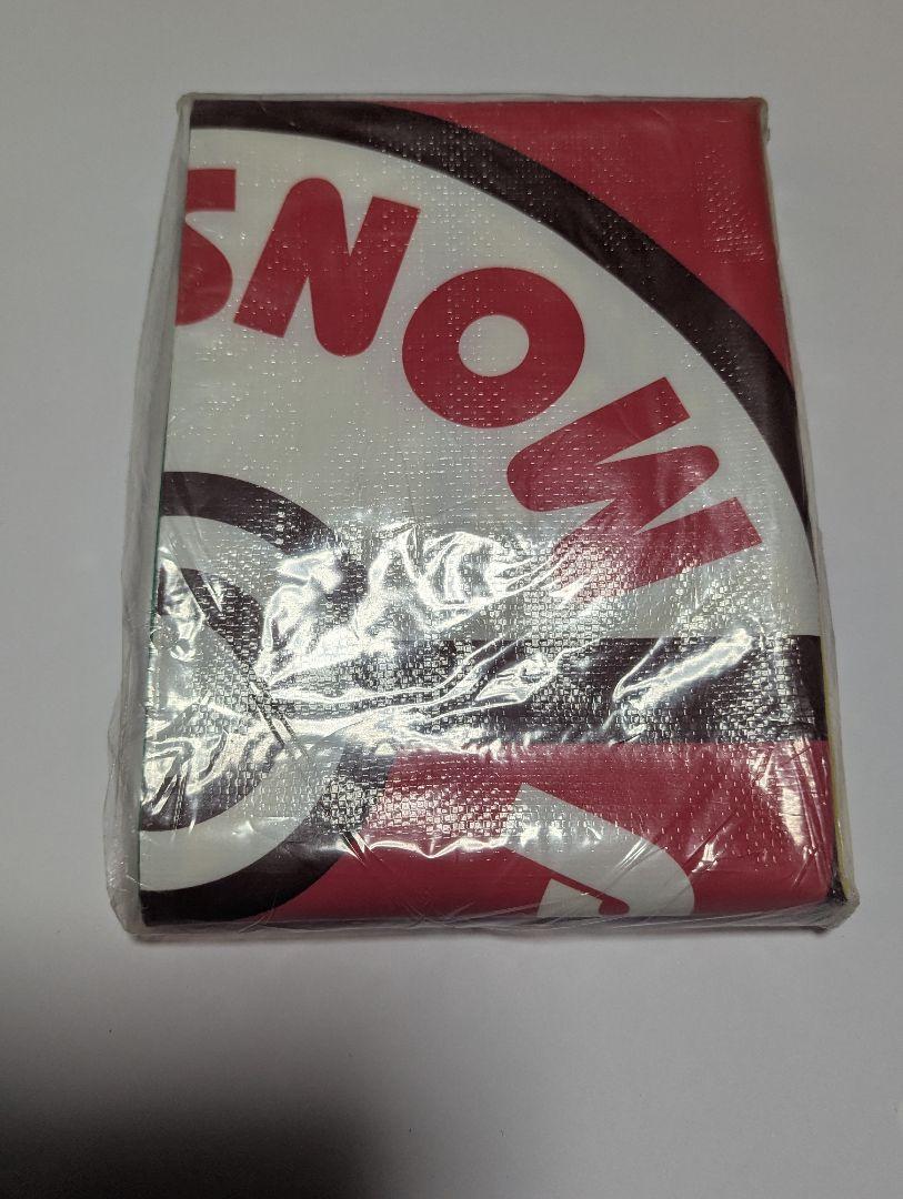 Folded, unopened Pokémon Monster Ball leisure sheet in clear plastic packaging on a white background.