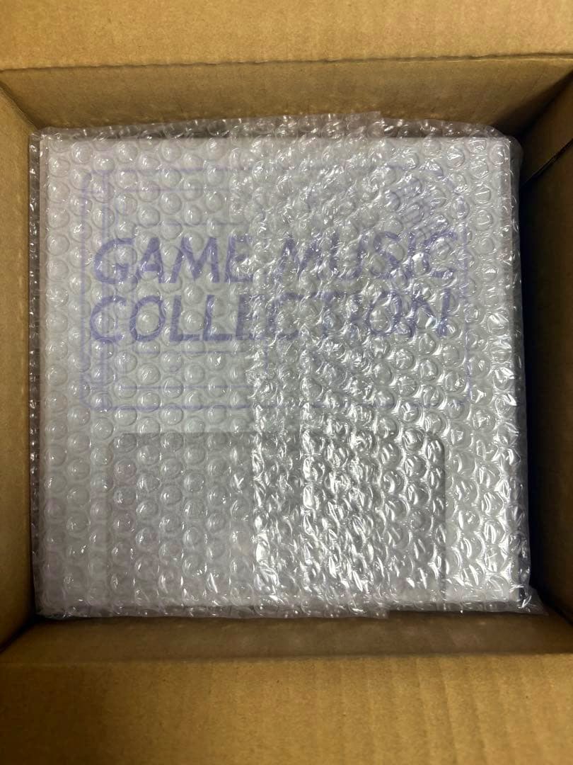 Bubble-wrapped ポケモン赤・緑 with GAME BOY さいせいマシン inside a cardboard box.