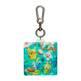 A square acrylic keychain showing Pikachu and Galar starter Pokémon artwork with a metal clasp and ring.