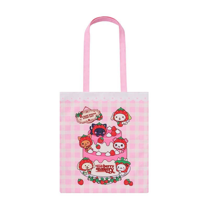 Front view of a pink polyester tote bag with long pink handles and a strawberry-themed character and cake print on a gingham background.