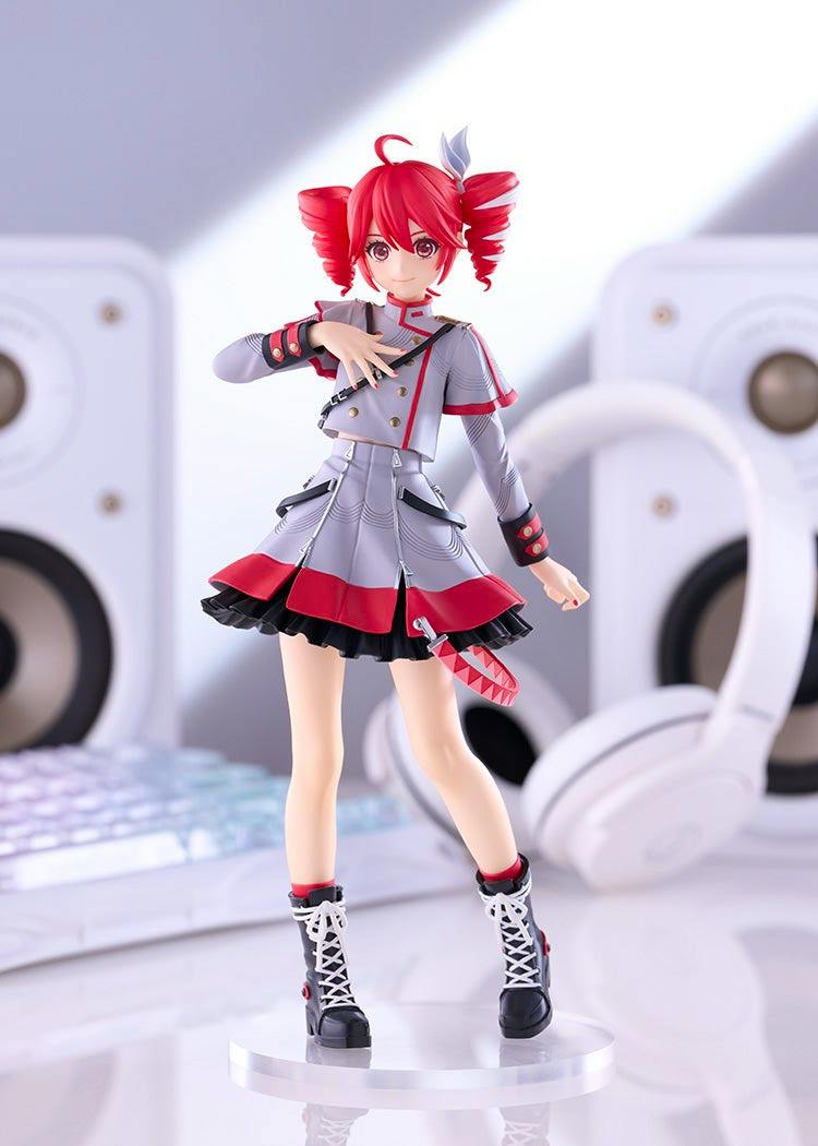 Full-body photo of the POP UP PARADE Kasane Teto: Synthesizer V AI Ver. L Size plastic figure on a clear round base, showing red twintail hair and a gray-and-red outfit.