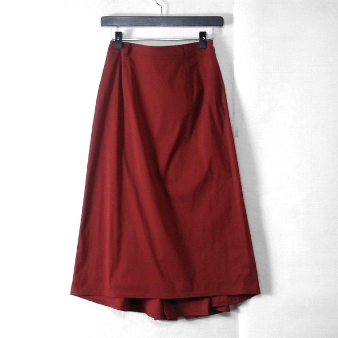 Bordeaux (burgundy) flared long women's cotton skirt hanging on a hanger against a white background.