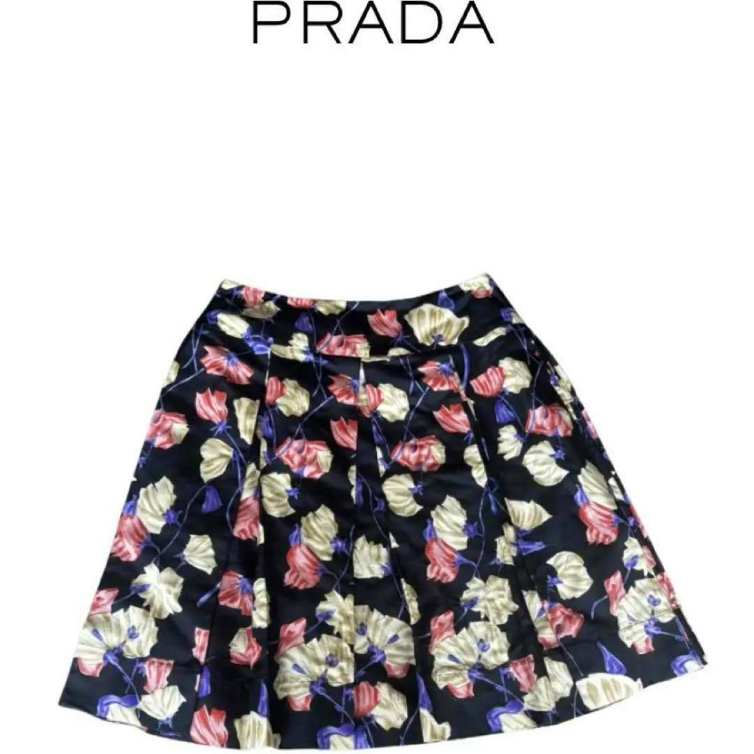 Prada floral skirt with pink, cream, and purple flowers laid flat on a white background.