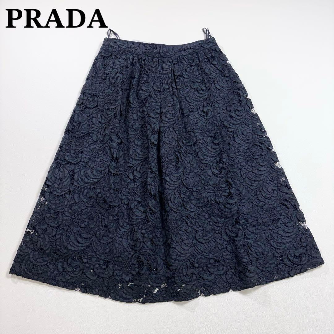 Dark navy floral lace women's flare skirt laid flat on a white background.