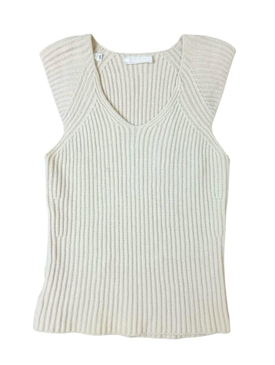 Beige ribbed sleeveless PRADA wool-cashmere knit pullover laid flat.