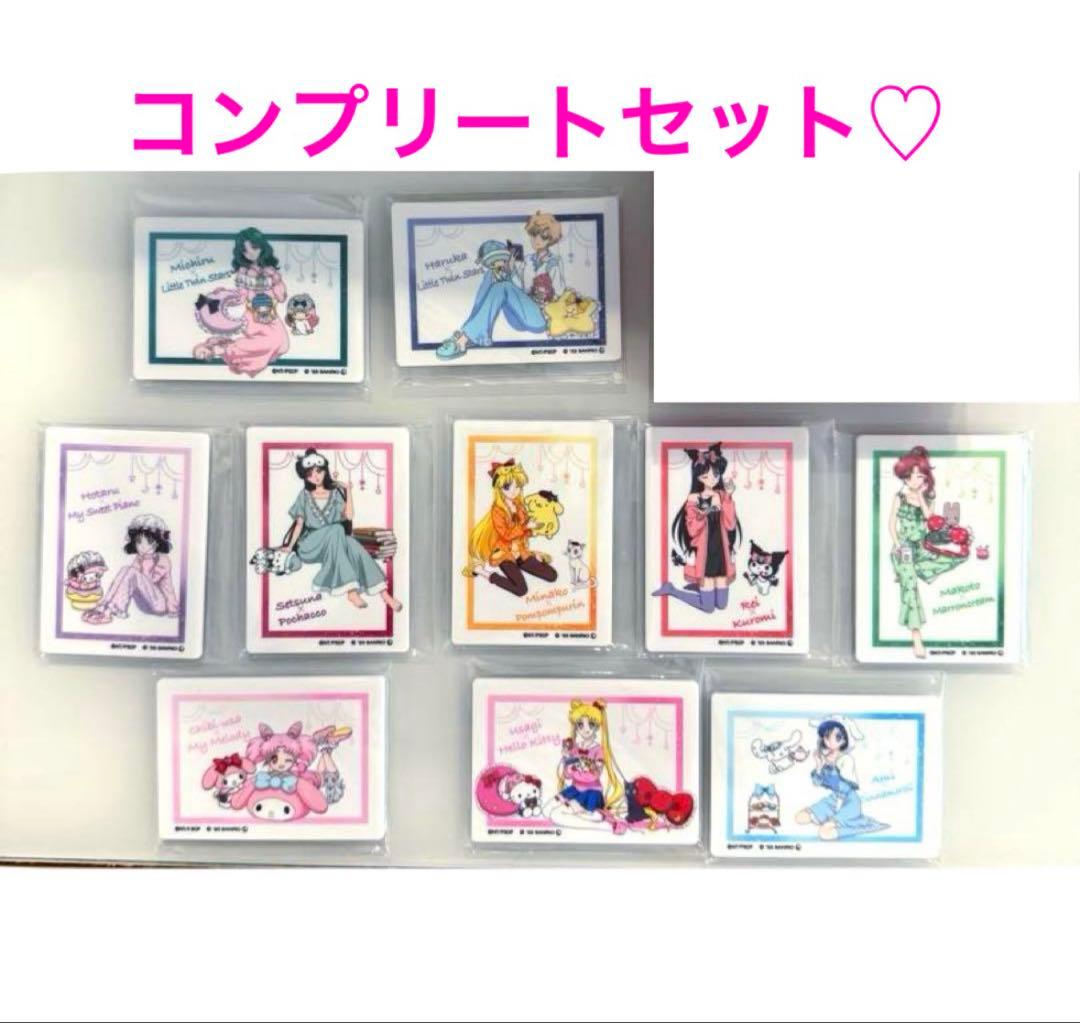 Complete set of Sailor Moon x Sanrio acrylic fridge magnets shown in individual plastic sleeves arranged on a white background.