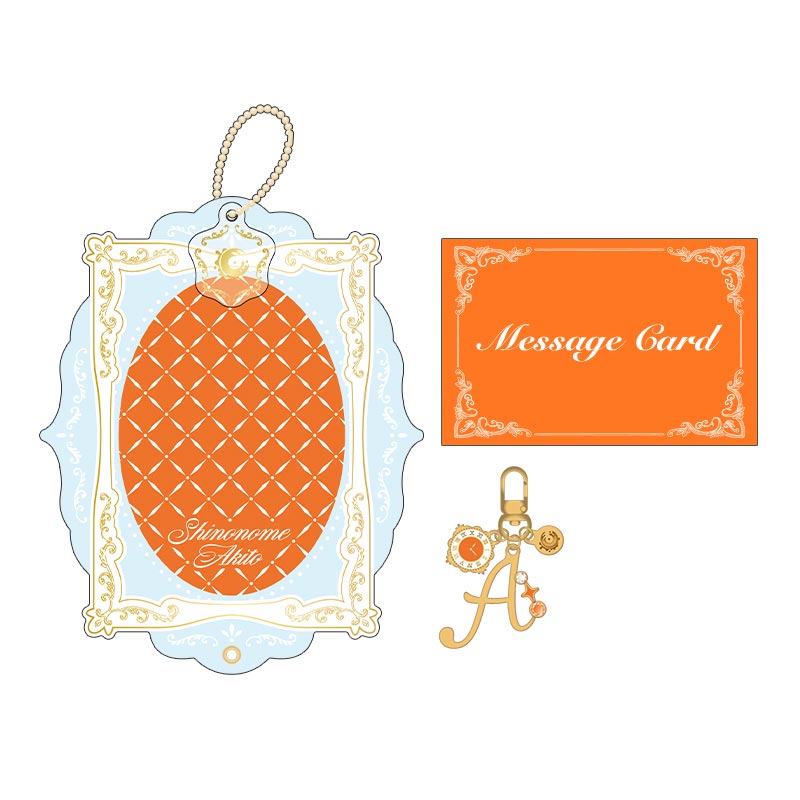 Mockup illustration of the gift set showing a decorative frame card, an orange message card, and the bag charm with an 'A' charm.