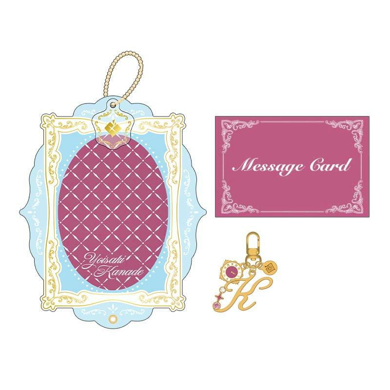 Illustration of the bag charm, message card, and decorative backing for the プロセカ バースデーギフトシリーズ2026 Luminous Celebration 宵崎 奏 ギフトセット.