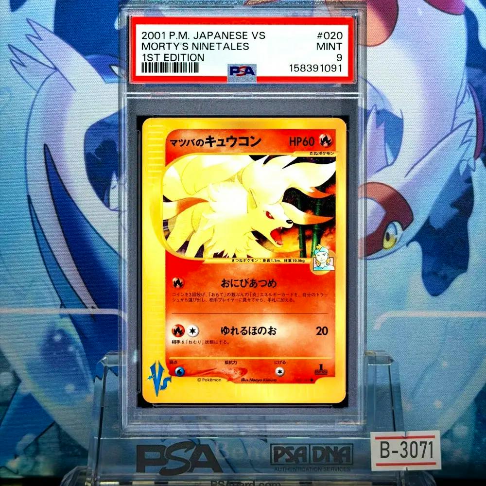 PSA-graded Japanese Morty's Ninetales trading card (PSA 9) shown in a clear protective slab on a stand.