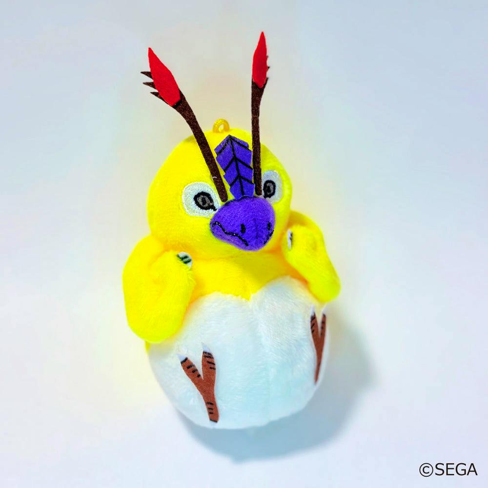 A yellow and white Rag Rappy plush toy with a purple beak and antennae photographed on a white background.