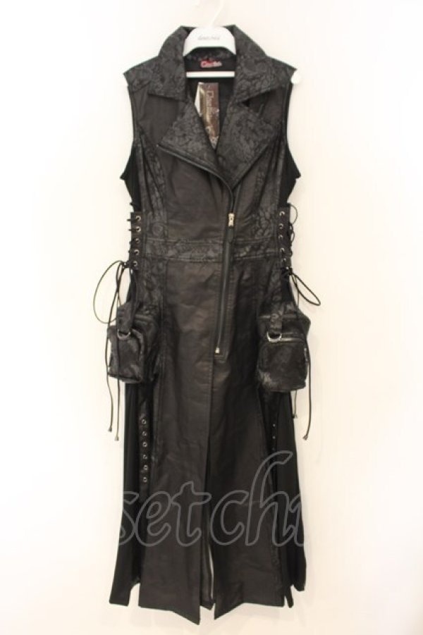 Black long rider-style cow leather vest with asymmetrical zipper, lace-up sides and two small side pouches hanging on a hanger against a white background.