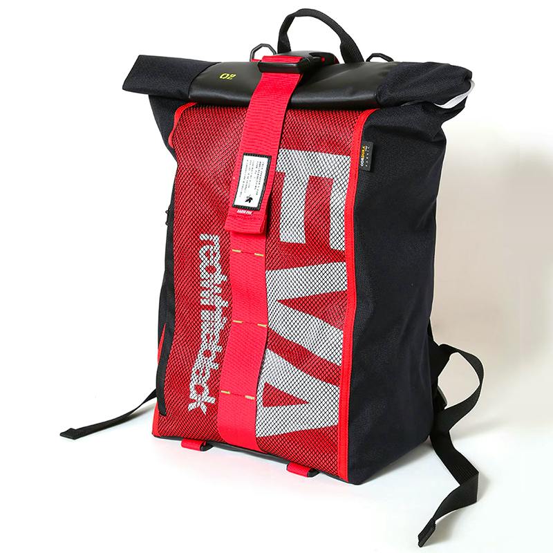 Front three-quarter view of the RADIO EVA 507 EVANGELION ROLL BACK PACK in black and red showing the mesh front panel, central buckle strap, and roll-top closure.