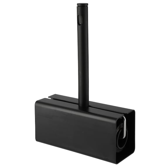 Black adhesive carpet roller with a vertical handle stored in a rectangular black case.