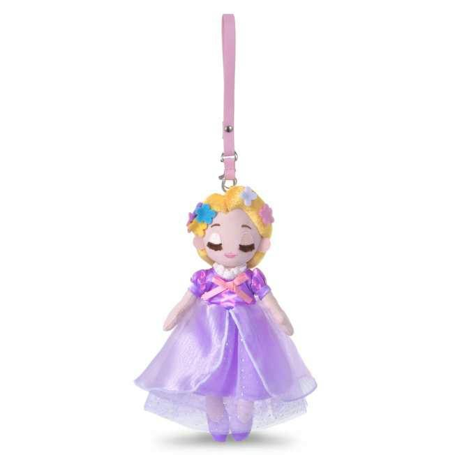 Plush Rapunzel keychain doll wearing a purple dress with a pink hanging strap.