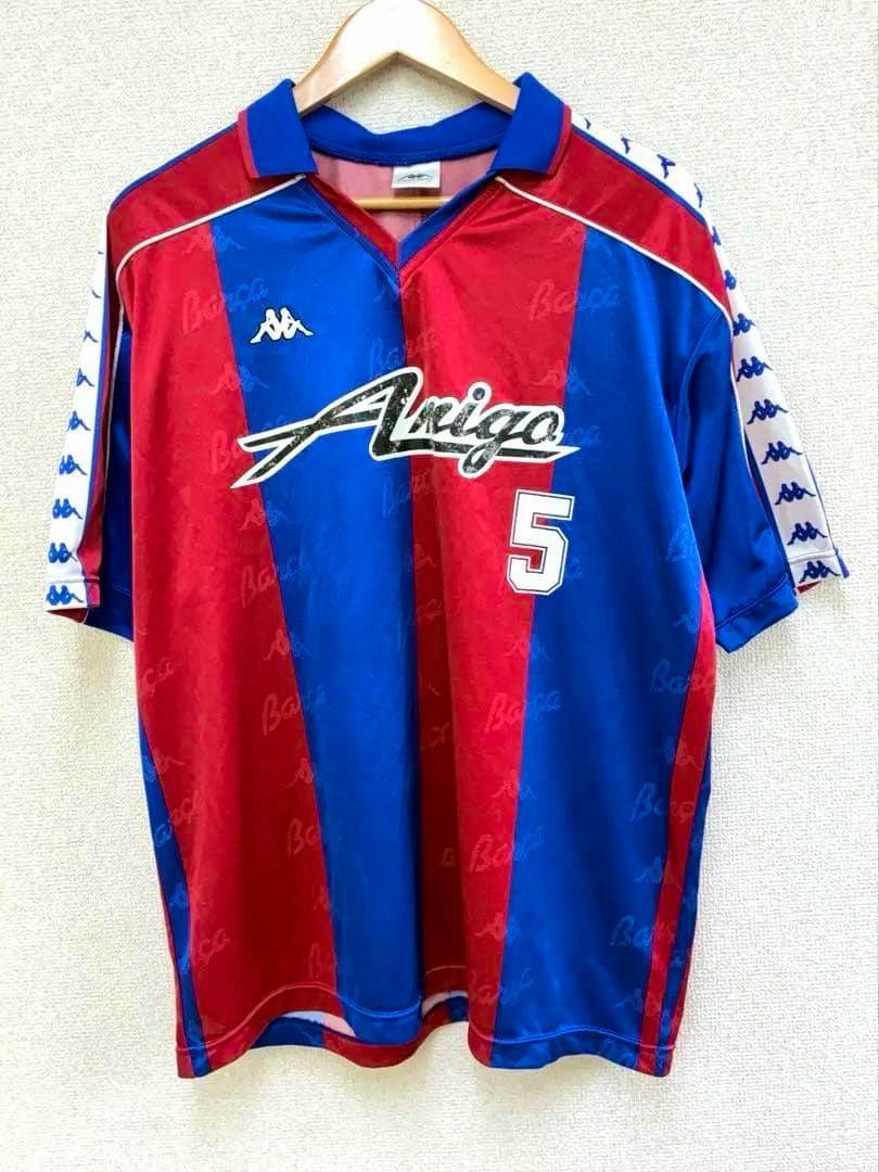 Front of the Kappa Barcelona model short-sleeve soccer jersey in red and blue showing the "Amiga" sponsor logo and the number 5.