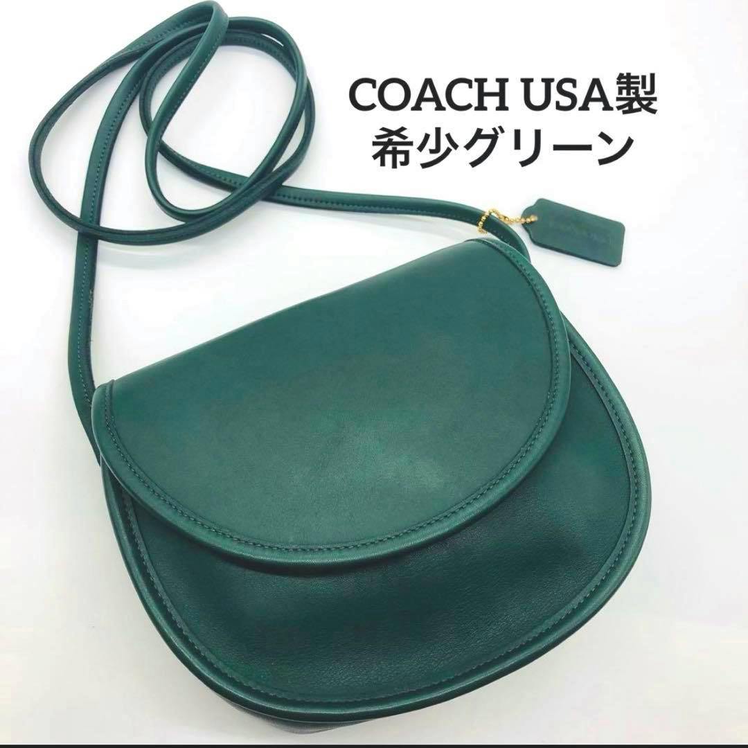 Green OLD COACH cow leather shoulder bag with long strap and hang tag on a white background.