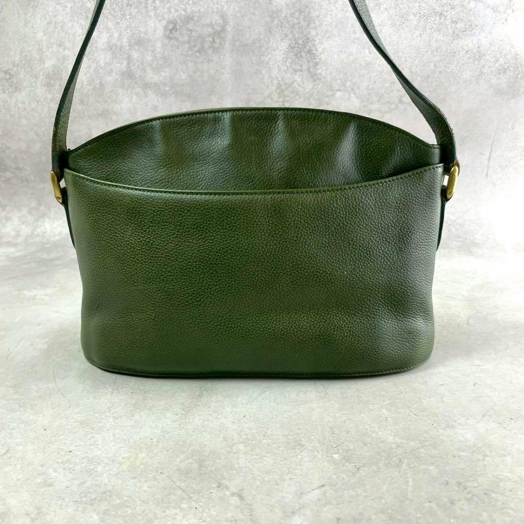 Front view of a green Old Coach Madison pebbled cow leather shoulder bag with a single strap.