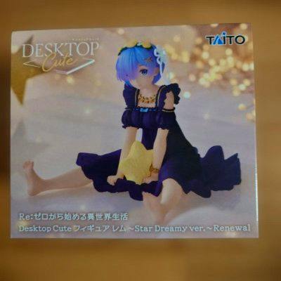 Photograph of the boxed product showing a Rem figure in a dark dress seated and holding a star.