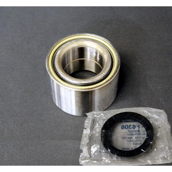 Rear hub bearing and a packaged rubber seal displayed on a gray background.