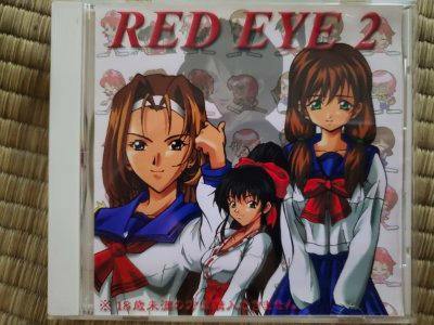Photograph of the RED EYE 2 CD case front showing illustrated female characters in school uniforms.
