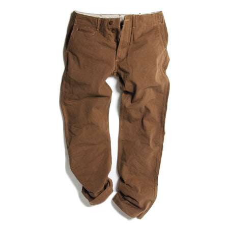 Front view of men's RED SELVEDGE YARN DYED chino pants laid flat on a white background.