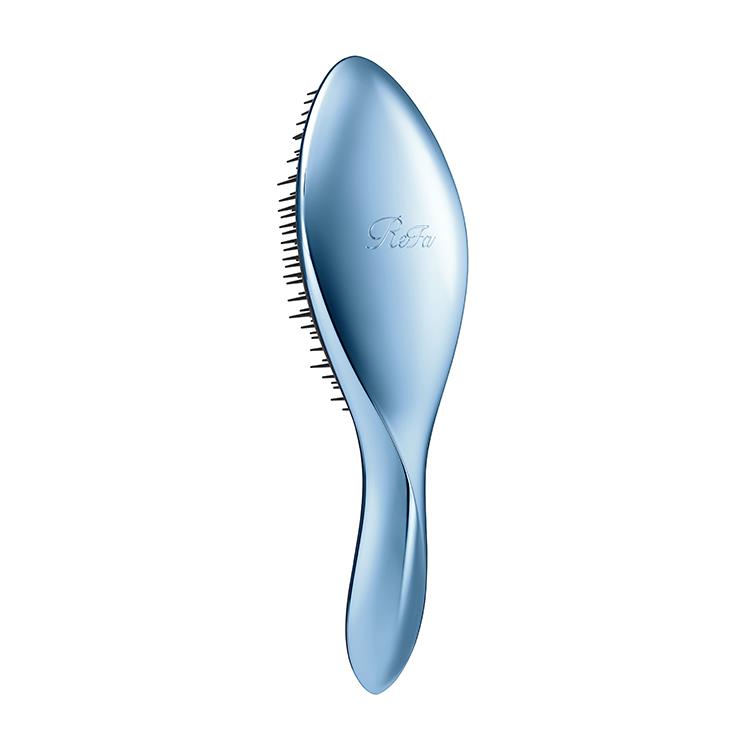 Marine-blue hair brush shown on a white background.