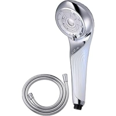 White and chrome handheld showerhead shown with a coiled stainless steel shower hose.