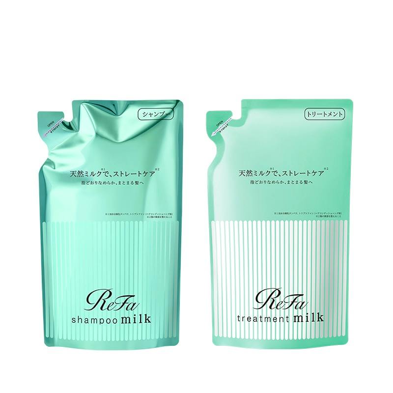 Two mint-green refill pouches of ReFa shampoo milk and ReFa treatment milk shown side by side.