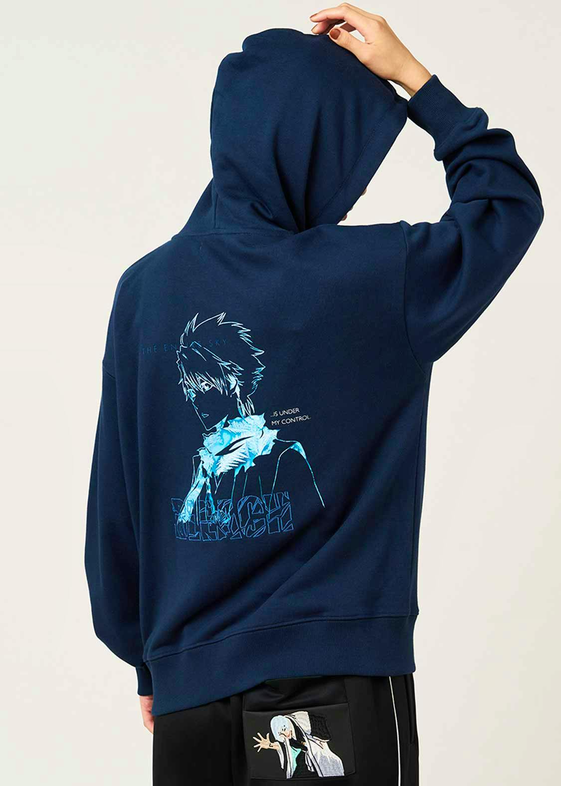 Back view of the navy big-silhouette cotton hoodie showing a blue anime-style "氷輪丸" print while worn by a model.