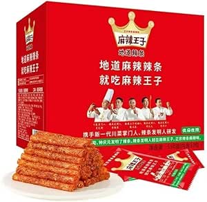 Red box of Reikido Spicy Prince spicy sticks with individual snack packets and a pile of stick-shaped spicy wafers displayed on a plate.