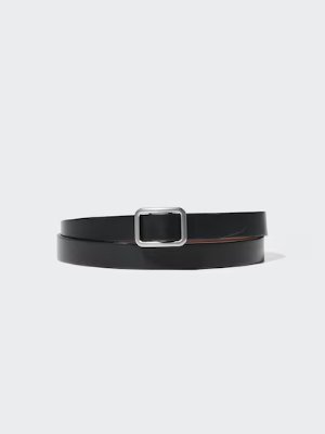 Black reversible narrow synthetic leather belt with a rectangular silver buckle on a white background.