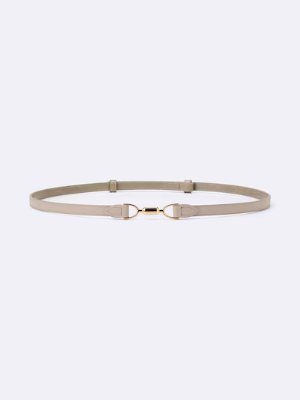 A thin synthetic-leather belt with a central metal clasp laid flat on a pale background.