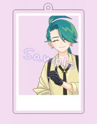 A rectangular acrylic keychain mockup showing an illustrated green-haired character smiling against a light purple background with the word "sample" across the image.