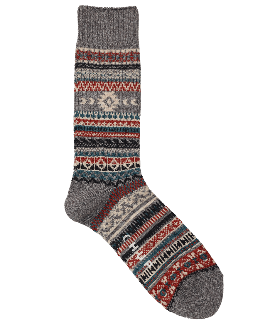 Gray cotton mid-thickness sock with a multicolor patterned design displayed on a black background.
