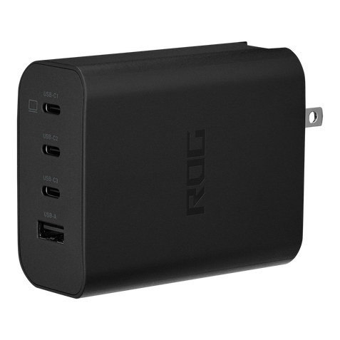 Black ROG 140W USB-C GaN charger shown at an angle with three USB-C ports and one USB-A port.