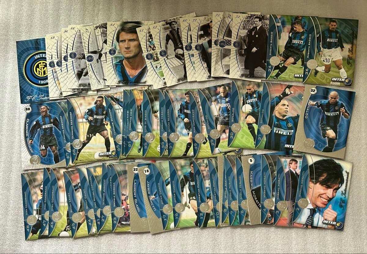 A large collection of Inter Milan football photocard trading cards laid out in rows on a light surface, showing multiple player portrait and action cards.