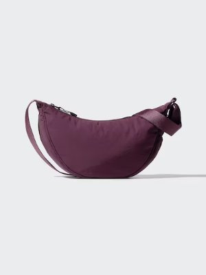 A purple round mini nylon shoulder bag shown on a light background.