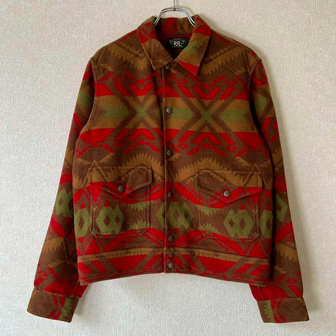 Front view of the RRL men's wool tracker jacket with a native brown, red, and green pattern hanging on a hanger.