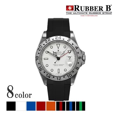 Black rubber replacement strap fitted to a Rolex Explorer II (16570) watch head with white dial, shown alongside the Rubber B logo and color swatches.