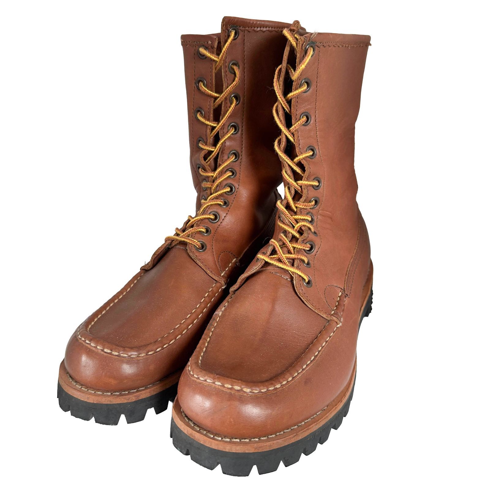 Pair of Russell Moccasin brown leather bird-shooter boots with moc toe and lug soles.