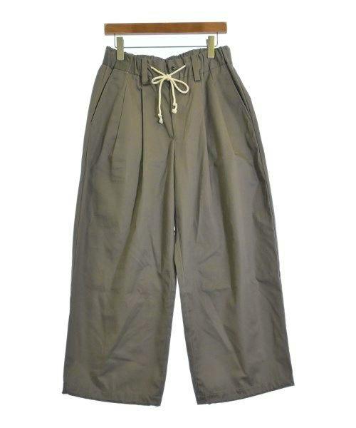 Front view of RYO TAKASHIMA men's cotton pants hanging on a wooden hanger against a white background.