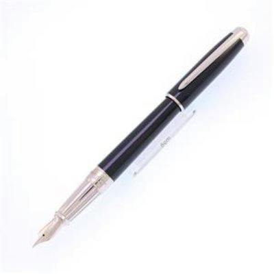 S.T. Dupont Line D fountain pen in shiny black lacquer with palladium trim, cap removed showing the medium nib on a white background.