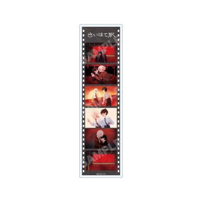 Clear bookmark shown front-facing with a vertical film-strip layout of illustrated character panels and Japanese title at the top.