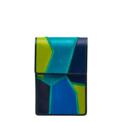 Front view of a Saint Laurent patchwork leather cigarette case in navy, yellow, and green.