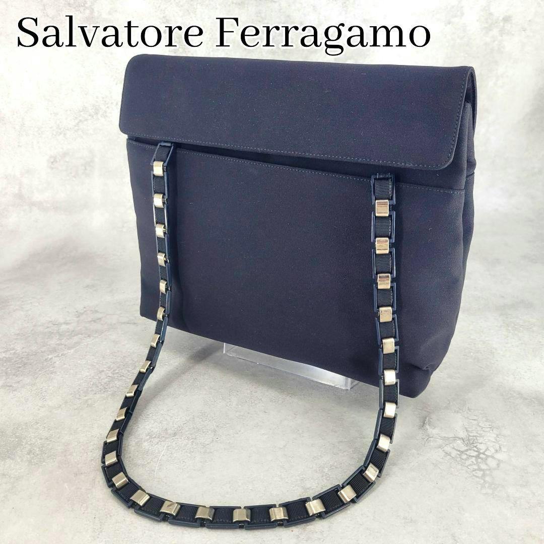 Black Salvatore Ferragamo Vara ribbon chain shoulder bag shown standing with its chain strap draped in front.