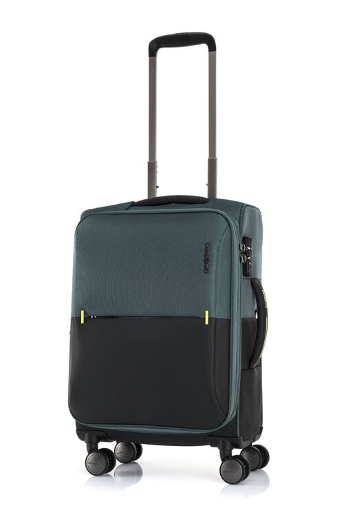 Green Samsonite handcarry spinner suitcase with telescoping handle extended, front pocket, and four wheels.