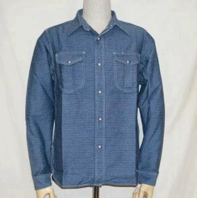 Front view of an indigo long-sleeve cotton work shirt with a checkered pattern displayed on a mannequin.
