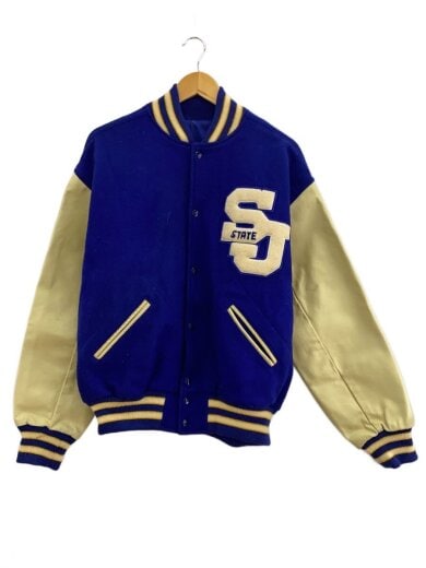 Front view of a blue wool San Jose State varsity men's jacket with cream sleeves hanging on a hanger.