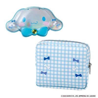 A Cinnamoroll-shaped makeup palette next to a blue gingham zippered pouch decorated with small bows.