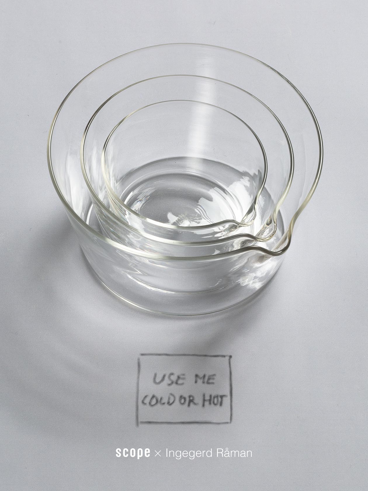 Three clear heat-resistant glass bowls nested together on a light background.